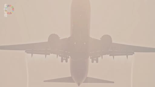 Vue frontale d'un avion de ligne en approche finale avec le train d'atterrissage sorti, illustrant le transport aérien et les enjeux environnementaux liés aux émissions de CO2.