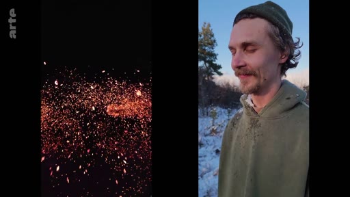 Un homme portant un bonnet et un sweat-shirt à capuche est filmé en extérieur dans un paysage enneigé, tandis qu'une animation d'étincelles apparaît sur la partie gauche de l'écran.